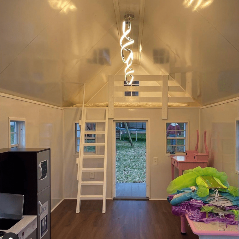 The interior of an outdoor playhouse by Westwood Sheds in South Carolina.